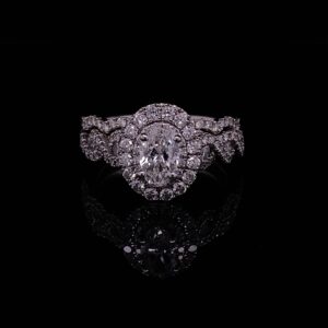 Neil Lane 14K White Gold Oval Halo Ring With Matching Band 1.50 Carat Total weight. Color H SI 1